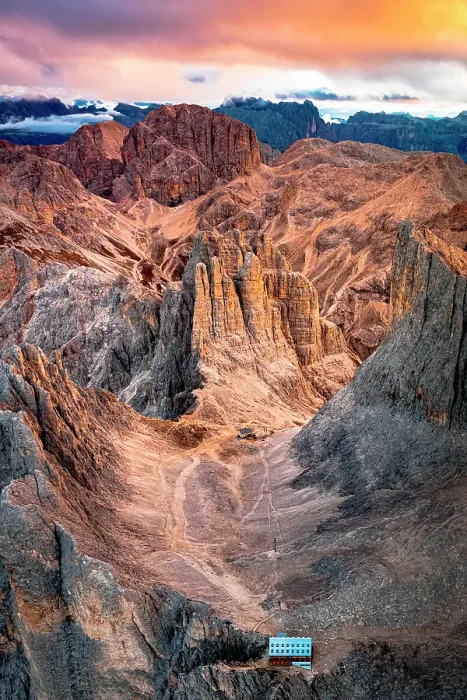 Framed Print : Rifugio Passo Santner mountain hut and Torri Del Vajolet pinnacles at dawn in autumn, helicopter view, Dolomites, Italy Framed Print : Rifugio Passo Santner mountain hut and Torri Del Vajolet pinnacles at dawn in autumn, helicopter view, Dolomites, Italy