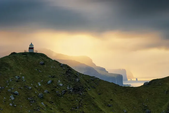 Framed Print : Risin og Kellingin during an autumn sunset, with the Kallur lighthouse in foreground, Eysturoy, Faroe Islands, Denmark Framed Print : Risin og Kellingin during an autumn sunset, with the Kallur lighthouse in foreground, Eysturoy, Faroe Islands, Denmark