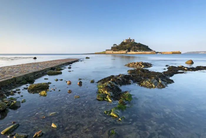 Framed Print : Rising tide floods Mounts Bay and the stone causeway at St Michaels Mount, Marazion Framed Print : Rising tide floods Mounts Bay and the stone causeway at St Michaels Mount, Marazion