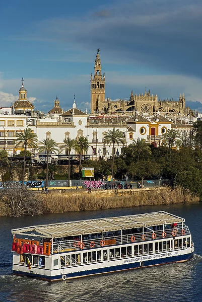 River Guadalquivir with Cathedral and Giralda bell tower in the background, Seville