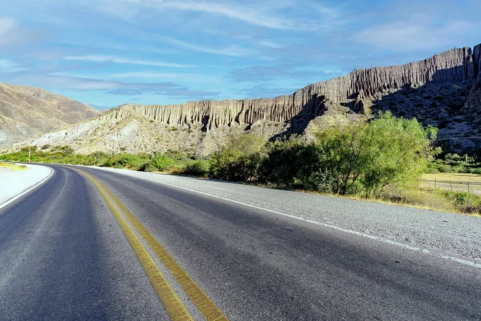 Framed Print : Road alongside rock formations, Tumbaya, Jujuy, Argentina Framed Print : Road alongside rock formations, Tumbaya, Jujuy, Argentina