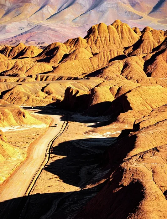 Framed Print : Road crossing the rocky landscape of Labyrinth desert, Puna, Salta, Argentina Framed Print : Road crossing the rocky landscape of Labyrinth desert, Puna, Salta, Argentina