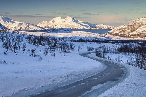 Road Through Wintry Landscape, Vengsoytinden & Kvantotinden in Distance, Vengsoya Island, Tromso, Norway
