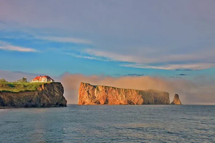 Framed Print : Roche Perce and Atlantic Ocean sin fog at sunrise on Gaspe Peninsula, Perce, Quebec, Canada Framed Print : Roche Perce and Atlantic Ocean sin fog at sunrise on Gaspe Peninsula, Perce, Quebec, Canada