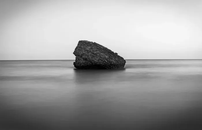 Framed Print : Rock (an old watch tower or beacon) at Matalascanas beach at sunset, Andalucia, Spain