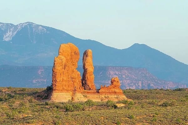 Rock formation against mountains, Arches National Park, Grand County, Utah, USA