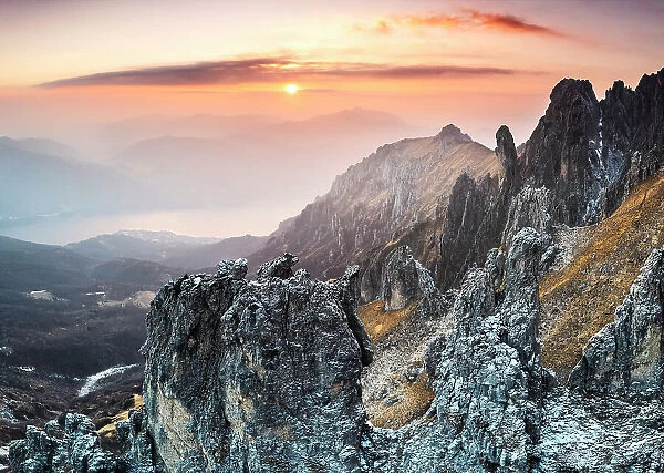 Rock pinnacles of Grignetta at sunset. Grigne group, Lake Como, Lombardy, Italy