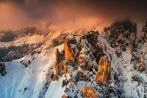 Rock pinnacles of Grignetta at sunset with Rifugio Rosalba. Grignetta, Grigne group, Lake Como, Lombardy, Italy