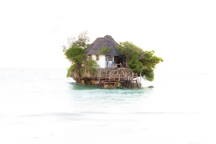 Framed Print : The Rock, a small restaurant built on a coral outcrop in the sea off Michamvi Pingwe Beach, Zanzibar, Tanzania Framed Print : The Rock, a small restaurant built on a coral outcrop in the sea off Michamvi Pingwe Beach, Zanzibar, Tanzania
