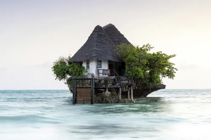Framed Print : The Rock, a small restaurant built on a coral outcrop in the sea off Michamvi Pingwe Beach, Zanzibar, Tanzania Framed Print : The Rock, a small restaurant built on a coral outcrop in the sea off Michamvi Pingwe Beach, Zanzibar, Tanzania