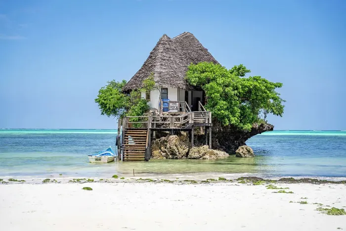Framed Print : The Rock is a unique ocean restaurant nestled on the shores of Michamvi Pingwe Beach in Zanzibar, Tanzania, Africa Framed Print : The Rock is a unique ocean restaurant nestled on the shores of Michamvi Pingwe Beach in Zanzibar, Tanzania, Africa