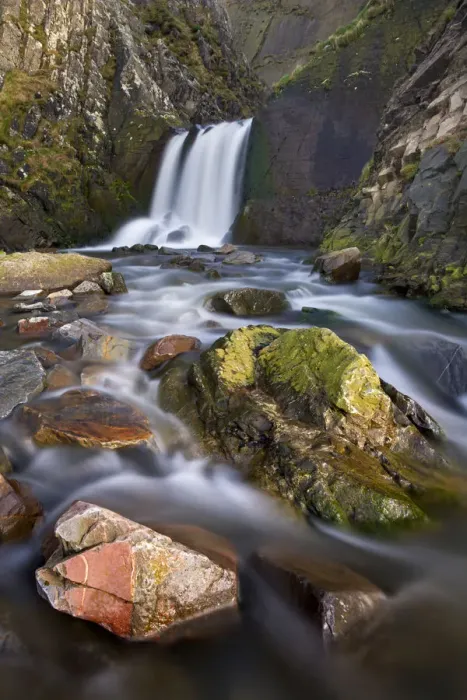 Framed Print : Rocks, stream and waterfall at Spekes Mill Mouth beach in North Devon, England. Spring Framed Print : Rocks, stream and waterfall at Spekes Mill Mouth beach in North Devon, England. Spring