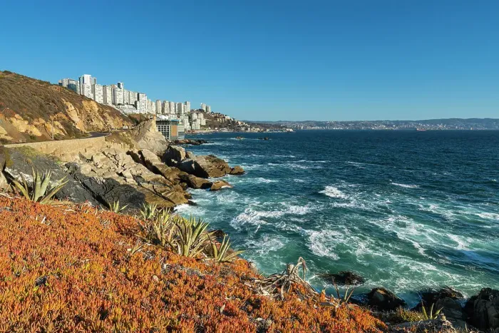 Framed Print : Rocky coastline by Roca Oceanica with distant view of residential high-rise buildings in Renaca, Concon, Valparaiso Province, Valparaiso Region, Chile Framed Print : Rocky coastline by Roca Oceanica with distant view of residential high-rise buildings in Renaca, Concon, Valparaiso Province, Valparaiso Region, Chile