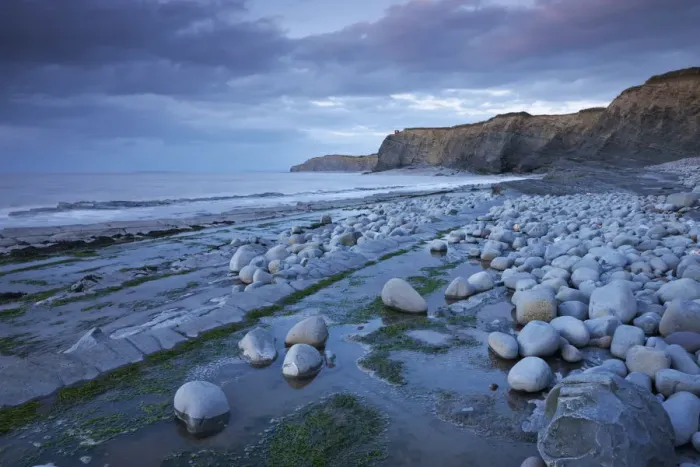 Framed Print : Rocky ledges of Kilve Beach on the Somerset Coast, England. Summer Framed Print : Rocky ledges of Kilve Beach on the Somerset Coast, England. Summer
