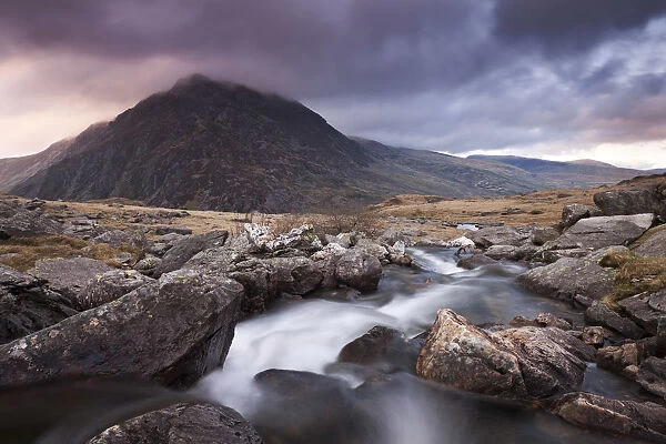 Rocky river flowing through mountains, Snowdonia, Wales, UK. Spring