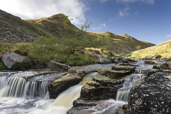 The rocky River Tavy flowing swiftly along Tavy Cleave in Dartmoor National Park, Devon