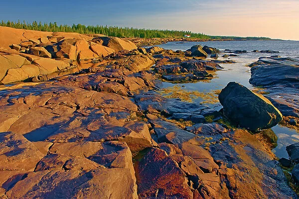 Rocky shoreline on the Gulf of St. Lawrence, Pointe des Monts, Quebec, Canada