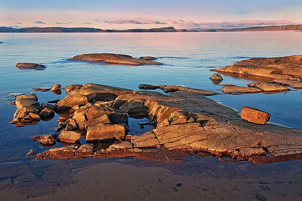 Rocky shoreline of Lake Superior (Great Lakes) at sunrise Rossport, Ontario, Canada