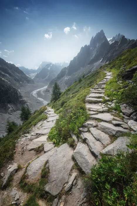 Framed Print : A rocky trail goes up in the mountains from the famous Mer de Glace above Chamonix. French Alps Framed Print : A rocky trail goes up in the mountains from the famous Mer de Glace above Chamonix. French Alps