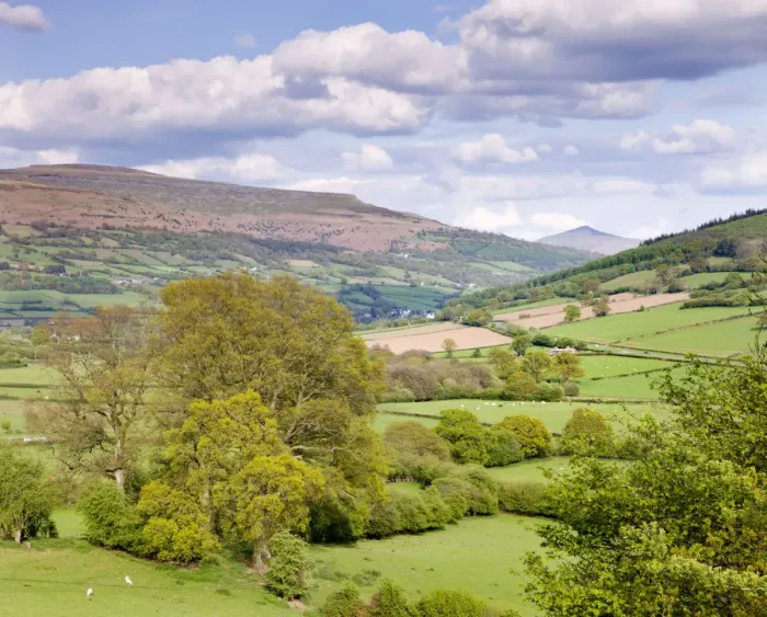 Framed Print : Rolling countryside near Bwlch with views to Sugar Loaf mountain, Brecon Beacons National Framed Print : Rolling countryside near Bwlch with views to Sugar Loaf mountain, Brecon Beacons National