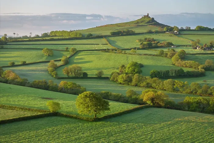 Framed Print : Rolling countryside view to Brentor Church in Dartmoor National Park, Devon, England. Spring (May) 2023