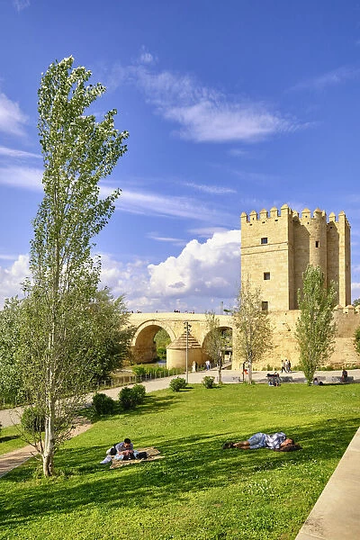 The Roman Bridge (Puente Romano) over Guadalquivir River and the Calahorra Tower, a fortified gate. A UNESCO World Heritage Site, Cordoba. Andalucia, Spain