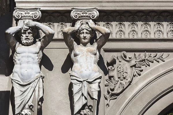 Romania, Bucharest, Lipscani Old Town, building detail, statues