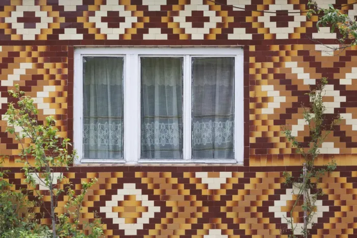 Framed Print : Romania, Transylvania, Viile Tecii, house detail with tile pattern Framed Print : Romania, Transylvania, Viile Tecii, house detail with tile pattern