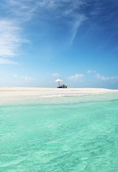A romantic picnic for two on a deserted sandbank in the Indian Ocean, Baa Atoll, Maldives