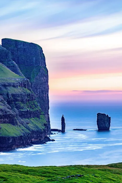 Framed Print : Romantic sky at sunset over Risin and Kellingin sea stacks washed by ocean waves, Eysturoy island, Faroe Islands Framed Print : Romantic sky at sunset over Risin and Kellingin sea stacks washed by ocean waves, Eysturoy island, Faroe Islands