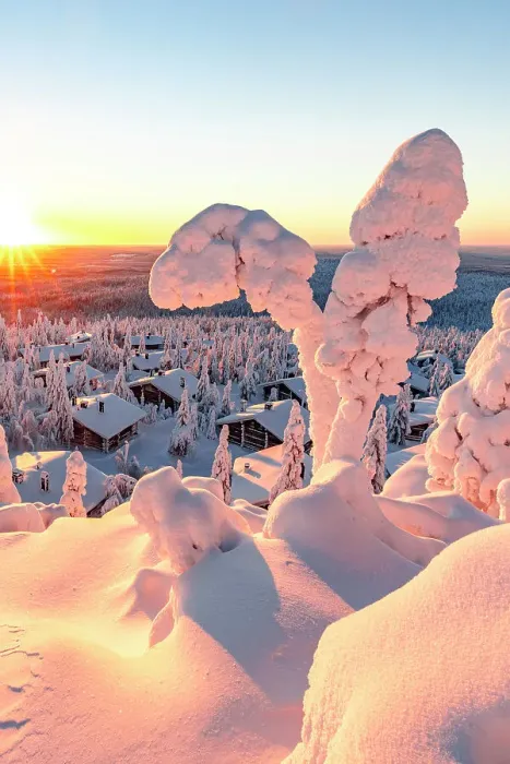 Framed Print : Romantic sunrise over ice sculptures surrounding traditional mountain huts covered with snow, Iso Syote, Lapland, Finland Framed Print : Romantic sunrise over ice sculptures surrounding traditional mountain huts covered with snow, Iso Syote, Lapland, Finland