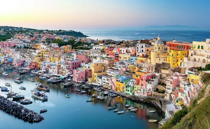 Framed Print : Romantic sunset over the colorful facades and harbor of Procida island, Gulf of Naples, Campania, Italy Framed Print : Romantic sunset over the colorful facades and harbor of Procida island, Gulf of Naples, Campania, Italy
