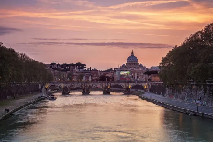 Framed Print : A romantic sunset on Tiber River with bridge Umberto I and Basilica di San Pietro