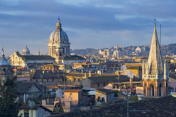 Rome, Lazio, Italy. Basilicas and roofs seen from Pincio hill