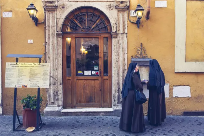 Framed Print : Rome, Lazio, Italy. Sisters in front of a restaurant in Trastevere Framed Print : Rome, Lazio, Italy. Sisters in front of a restaurant in Trastevere