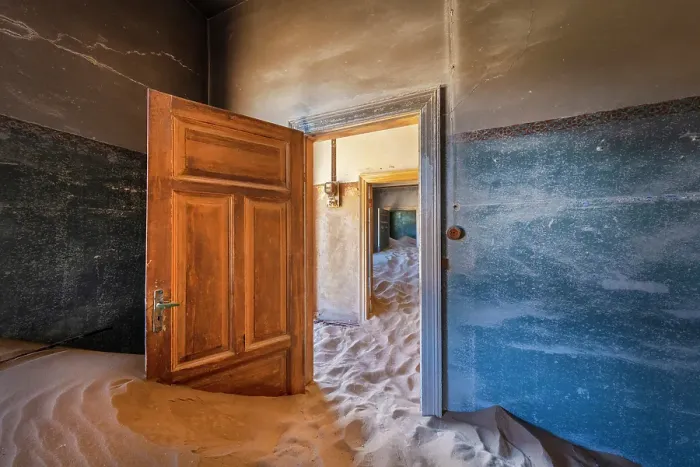 Framed Print : Rooms full of sand in abandoned diamond mining town of Kolmanskop, Luderitz, Namib Desert, Namibia Framed Print : Rooms full of sand in abandoned diamond mining town of Kolmanskop, Luderitz, Namib Desert, Namibia