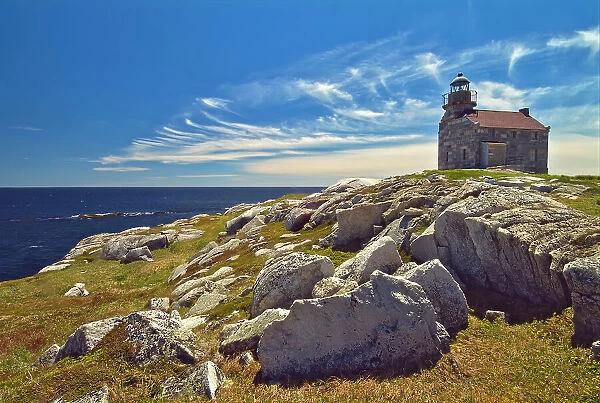 Rose Blanche Lightouse. Rocky shoreline along the Atlantic Coast with old granite lighthouse Rose Blanche Newfoundland Canada