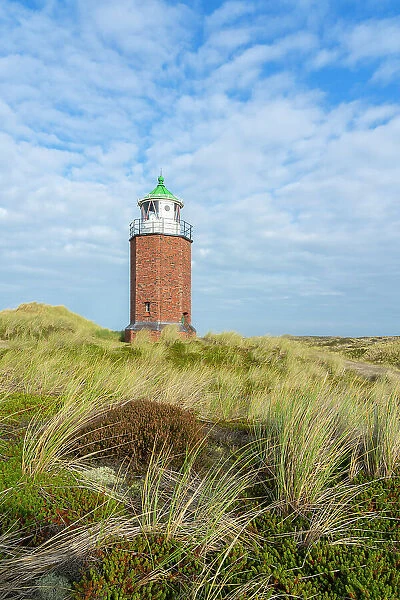 Rotes Kliff lighthouse on grassy landscape, Kampen, Sylt, Nordfriesland, Schleswig-Holstein, Germany