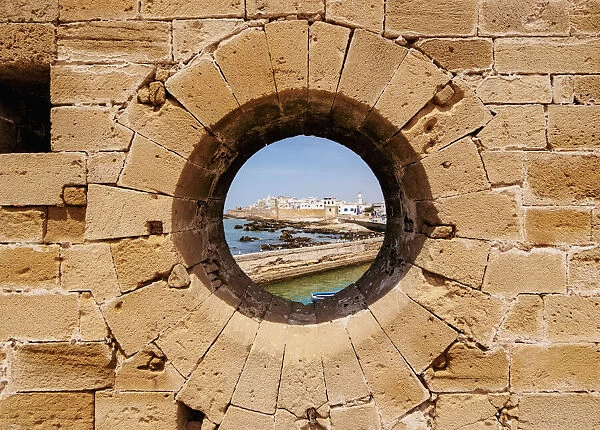 Round window in the walls of the Citadel by the Scala Harbour, Essaouira