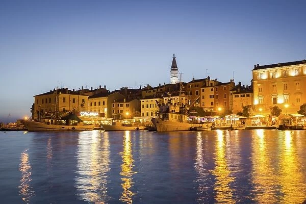 Rovinj, Croatia, Europe. View of the city at dusk from the harbour