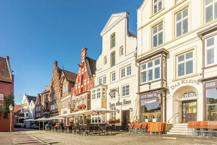 Framed Print : Row of houses at Am Stintmarkt with outdoor terraces, Luneburg, Lower Saxony, Germany