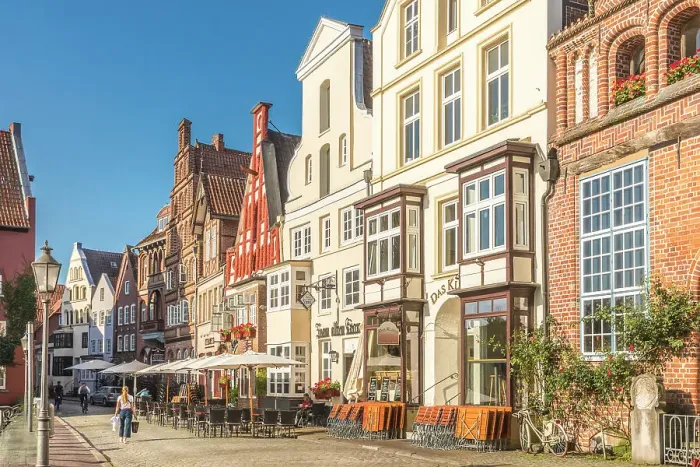 Framed Print : Row of houses at Am Stintmarkt with outdoor terraces, Luneburg, Lower Saxony, Germany