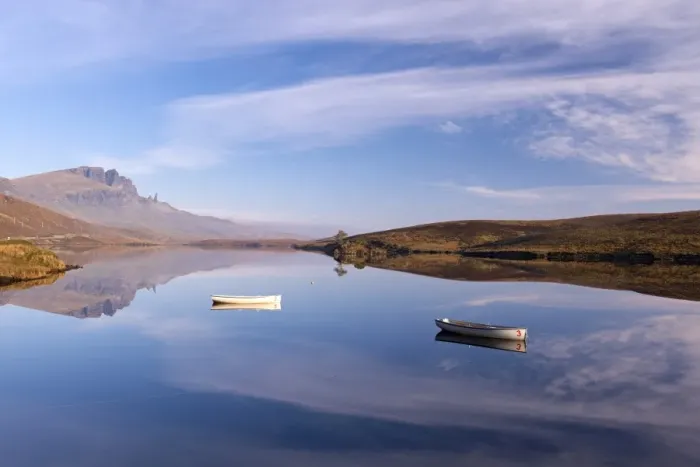 Framed Print : Rowing boats on Loch Fada, with the Old Man of Storr beyond, Isle of Skye, Scotland Framed Print : Rowing boats on Loch Fada, with the Old Man of Storr beyond, Isle of Skye, Scotland