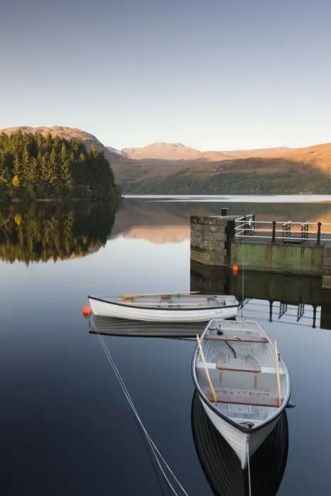 Framed Print : Rowing boats moored on Loch Katrine at Stronachlachar, Stirling, Scotland. Autumn Framed Print : Rowing boats moored on Loch Katrine at Stronachlachar, Stirling, Scotland. Autumn