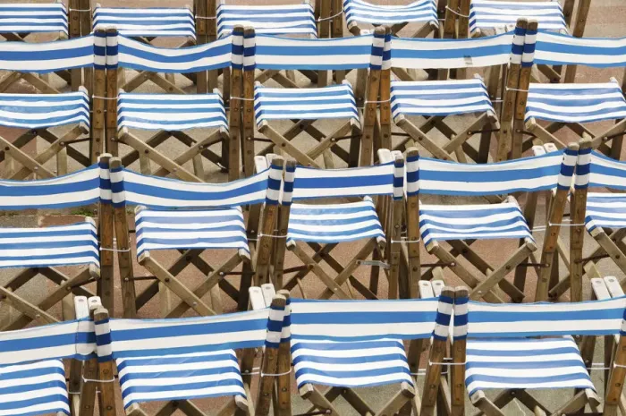 Framed Print : Rows of traditional blue and white deckchairs, Eastbourne, Sussex, UK Framed Print : Rows of traditional blue and white deckchairs, Eastbourne, Sussex, UK