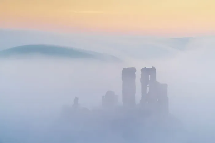 Framed Print : The ruins of Corfe Castle emerging from mist at dawn, Corfe Castle, Dorset, England. Winter (February) 2023 Framed Print : The ruins of Corfe Castle emerging from mist at dawn, Corfe Castle, Dorset, England. Winter (February) 2023
