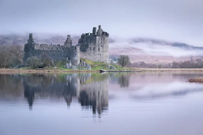 Framed Print : The ruins of Kilchurn Castle reflected in Loch Awe at dawn on a misty morning in the Scottish Highlands, Argyll and Bute, Scotland. Winter (March) 2017 Framed Print : The ruins of Kilchurn Castle reflected in Loch Awe at dawn on a misty morning in the Scottish Highlands, Argyll and Bute, Scotland. Winter (March) 2017