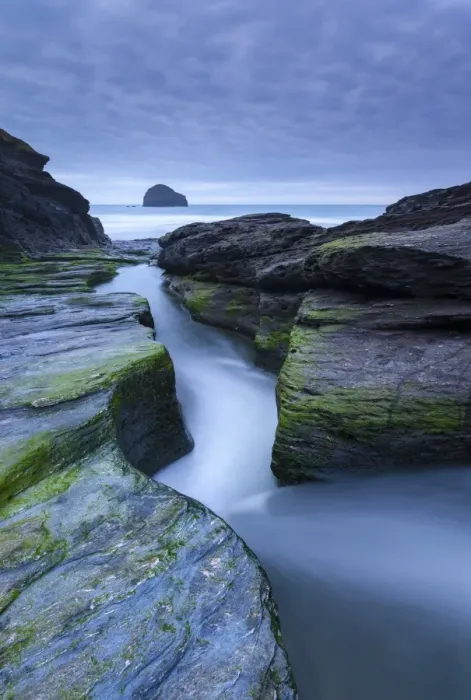 Framed Print : Rushing stream through eroded slate ledges, Trebarwith Strand, Cornwall, England Framed Print : Rushing stream through eroded slate ledges, Trebarwith Strand, Cornwall, England