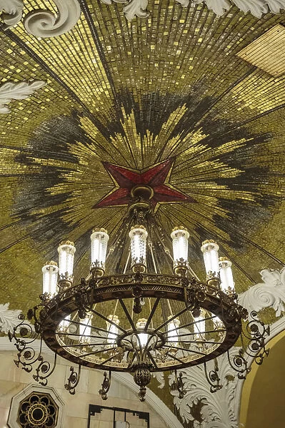 Russia, Moscow, Komsomolskaya Metro. Detail of a chandelier and ceiling