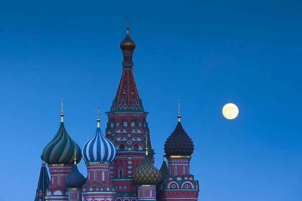 Russia, Moscow, Red Square, Kremlin, St. Basils Cathedral with moonrise